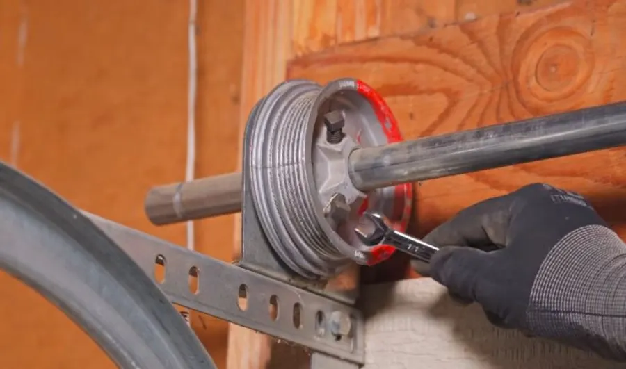 Disconnected garage door cable drums during a repair in Irving, TX