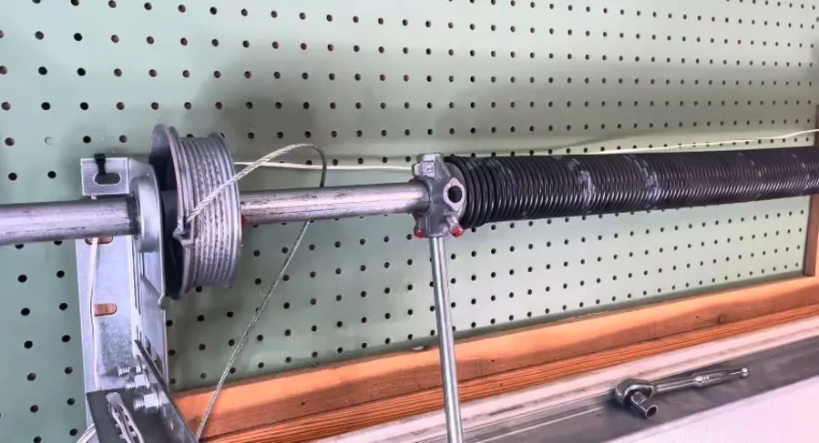 Garage door spring repair in progress in Irving, TX